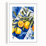 Abstract art print featuring assorted fruits in vibrant colors on a white framed mat, suitable for dining room decor.
