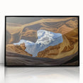 Framed acrylic artwork showcasing a stunning landscape of canyons in rich earthy tones, presented in a sleek black frame, perfect for modern home decor.