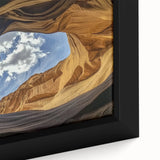 Close-up of a framed landscape canvas depicting vibrant canyons with rich earthy tones and intricate textures, ideal for modern home decor and art enthusiasts.