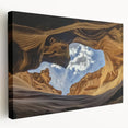 Stretched canvas artwork showcasing a vibrant landscape of canyons in warm hues of orange and red, perfect for enhancing home decor with a natural aesthetic.