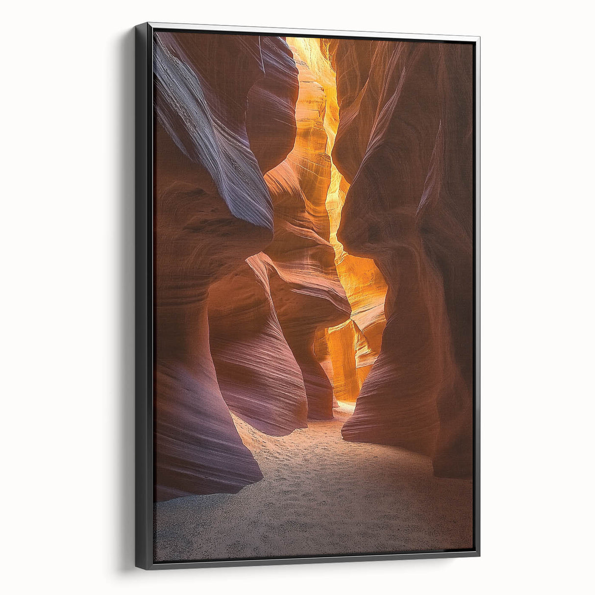Framed canvas artwork depicting a vibrant desert landscape with rich colors, featuring a black frame and side view showcasing its artistic depth and detail.