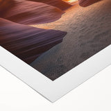 Desert landscape rolled canvas artwork showcasing warm hues of orange and brown, ideal for home decor, packaged securely in a protective cardboard tube.