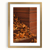 Extra large abstract art print depicting textured fall foliage in gold frame, suitable for living room decor.