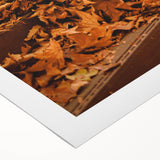 Art deco poster featuring a stylized autumn scene in warm orange and brown tones on rolled canvas.