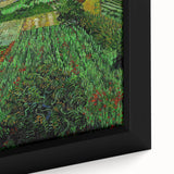 Close-up of a framed canvas featuring a textured, colorful abstract design in black, ideal for living room decor.