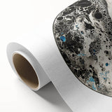 Abstract geometric rolled canvas artwork in vibrant shades of blue, orange, and yellow, showcasing a modern design ideal for contemporary home decor. The piece is elegantly packaged in a durable cardboard tube, ensuring safe delivery and protection.