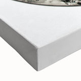 Close-up of a vibrant abstract geometric design on stretched canvas, showcasing intricate shapes and bold colors, perfect for modern home decor accents.