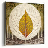 Framed canvas wall art featuring a vibrant floral design with intricate leaves, elegantly displayed with a silver frame, ideal for modern home decor.