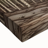 Close-up view of vibrant floral and botanical wall art on stretched canvas, showcasing intricate details of colorful flowers and lush green leaves, ideal for home decor.