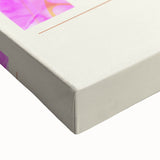 Close-up of a large black and white canvas featuring assorted pastries, ideal for bedroom wall art.