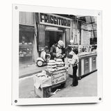 Large abstract wall art on acrylic glass depicting vibrant food and people scenes, ideal for dining room decor.