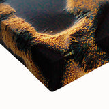 Close-up of a vibrant African tribal wall art design on stretched canvas, showcasing intricate patterns and textures, perfect for home décor or cultural displays.