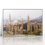 Framed acrylic print of an Egyptian landscape featuring pyramids, in muted earth tones, suitable for modern art wall decor.