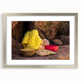 Abstract art print depicting Ethiopian scenery in muted earth tones on a framed silver mat.