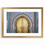 Textured art print of abstract Moroccan scenery in gold frame, featuring earthy tones, ideal for bedroom art.