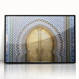 Large abstract wall art depicting a Moroccan landscape in muted earth tones, framed in black acrylic.