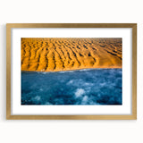 Textured abstract art print of a serene Namibian landscape in muted earth tones, framed in gold, ideal for bedroom art.
