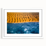 Extra large abstract art print of a textured Namibian landscape in muted earth tones, framed with a white mat.