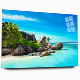 Large abstract wall art of a Seychelles beach scene in vibrant blue and green tones, printed on acrylic glass.