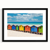 Abstract art print of a vibrant African scenery in a black frame, ideal for living room decor.