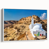 Vintage poster art of a Tunisian landscape on framed canvas, featuring vivid colors, ideal for living room decor.