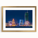 Extra large abstract art print featuring textured scenery of Asia, in muted gold and earth tones, framed with a gold mat.