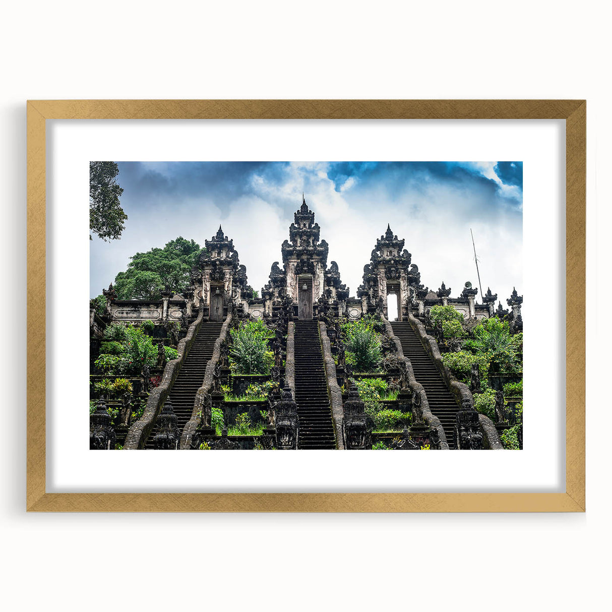 Extra large wall art featuring abstract Indonesian scenery in textured gold and earth tones, framed with mat.