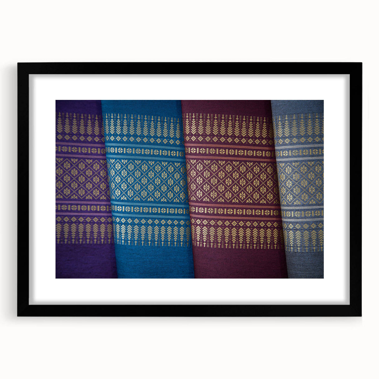 Abstract art print featuring vibrant, colorful textured scenery of Laos on a large framed canvas.