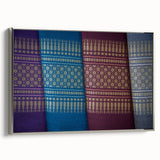 Framed canvas depicting a vintage-style Laos landscape with vibrant colors on a black background.