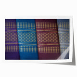 Extra large rolled print of a serene Laotian landscape with lush greens and floral elements, ideal for dining room wall art.