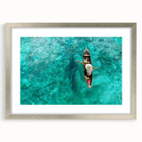 Textured abstract art print of a Malaysian landscape in muted earth tones, framed in silver, ideal for bedroom decor.