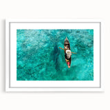 Abstract art print of a Malaysian landscape in muted earth tones on a framed white mat, ideal for dining room decor.