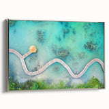 Framed canvas featuring a vintage-style landscape painting of the Maldives with vibrant blue and green hues.