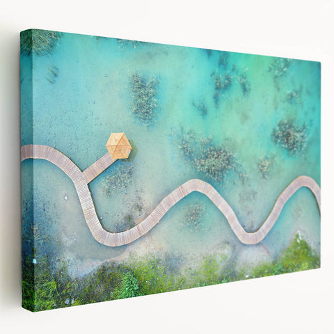 Large art print of a serene Maldivian beach on stretched canvas, featuring soft blue and white tones.