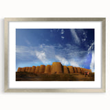 Textured art print of abstract scenery in muted earth tones on a framed canvas, ideal for bedroom wall decor.