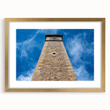 Extra large textured abstract art print depicting a serene Sri Lankan landscape in muted earth tones, framed in gold.