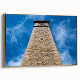 Framed canvas featuring a vintage-style landscape painting of a Sri Lankan scenery in muted gold and black tones.