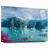 Acrylic print of a Vietnamese landscape, featuring lush greenery and mountains, in muted earth tones.