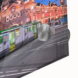 Large abstract wall art featuring the Melbourne skyline in muted blue and gray tones on acrylic glass.