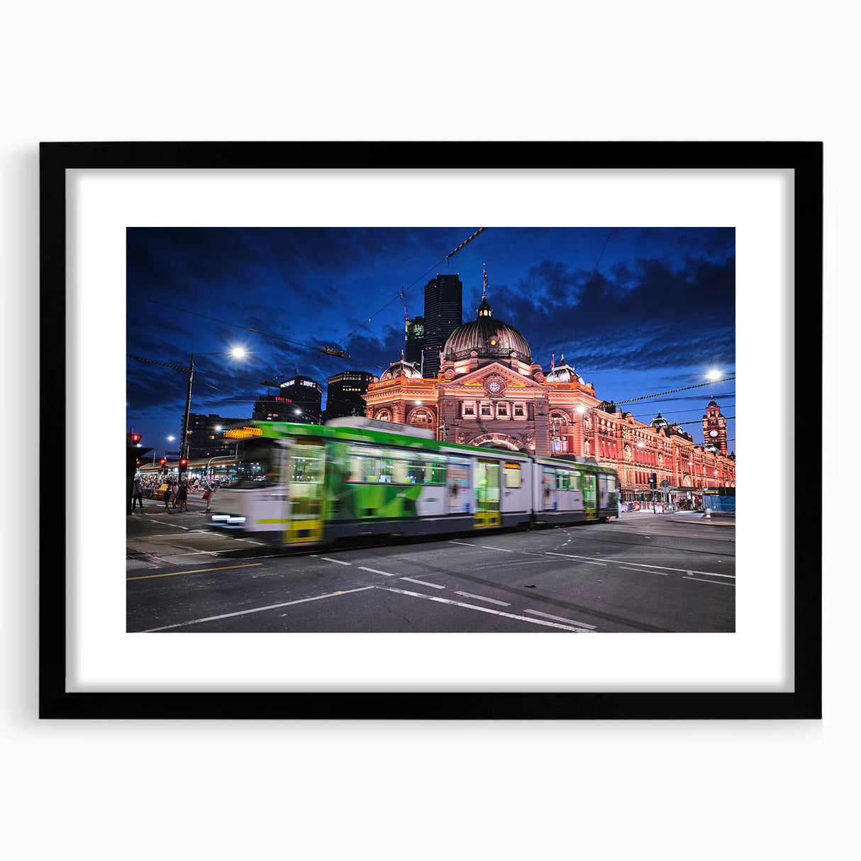 Extra large abstract art print of Melbourne skyline in vibrant colors on textured canvas, framed in black.