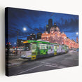 Panoramic view of Melbourne skyline in muted blue tones on a large stretched canvas, ideal for kitchen wall art.