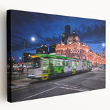 Panoramic view of Melbourne skyline in muted blue tones on a large stretched canvas, ideal for kitchen wall art.