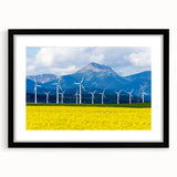 Extra large abstract art print depicting a colorful, textured scenery of Alberta, Canada, in a black frame with mat.