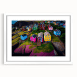 Abstract art print of Newfoundland scenery in muted blue and green tones on a white-framed canvas.