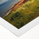 Art deco poster of Prince Edward Island landscape on rolled canvas, featuring muted earth tones.