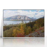 Acrylic print of Yukon scenery with muted green and blue tones, framed in white.