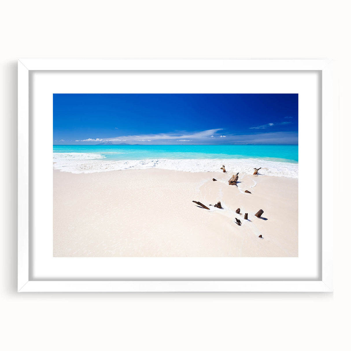 Textured abstract art print depicting Caribbean scenery in vibrant blue and green tones, framed with a white mat.