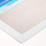Art deco poster of a Caribbean beach scene on rolled canvas, featuring serene blue and sandy hues.
