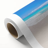 Art deco poster of Caribbean Antigua scenery on rolled canvas, featuring soft blue and green tones.