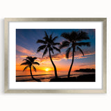 Extra large abstract art print of Caribbean scenery in silver frame, featuring textured blues and greens.